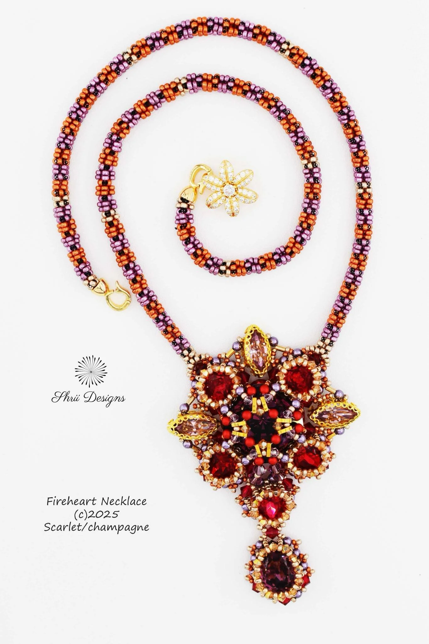 A multi-strand beaded necklace with a yellow floral clasp, a large beaded flower pendant, and a red and purple beaded drop pendant, displayed on a white background.