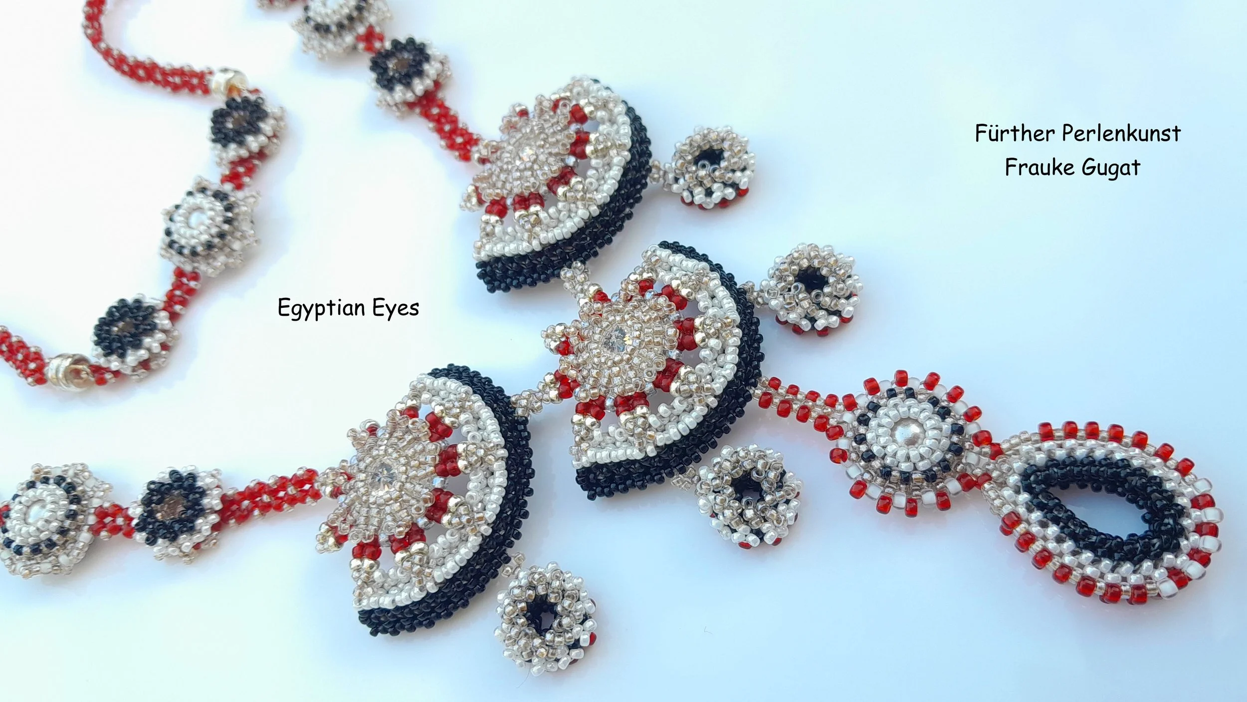 Beaded jewelry featuring floral and geometric patterns in black, white, red, and silver colors, labeled as Egyptian Eyes, Fürther Perlenkunst, Frauke Gugat.