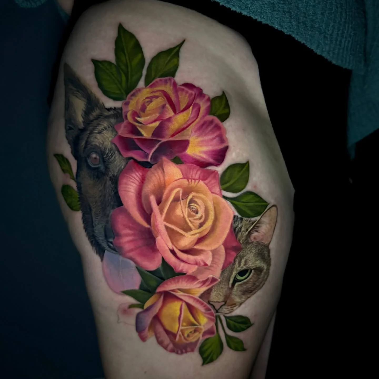 Started this thigh piece that will eventually grow into a full leg of florals 🌿 We included portraits of her dog and cat &mdash; my first time doing color portraits of either! Fun fact: I tattooed the dog upside down 🙃 because it gave me better acc