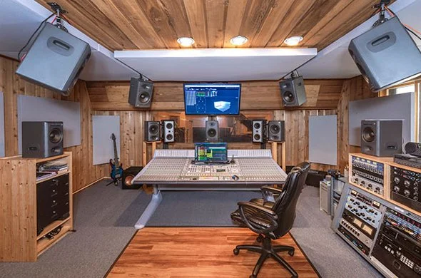 Professional audio post‑production control room at SpectraSound LLC featuring Dolby Atmos immersive audio mixing equipment in Quakertown PA