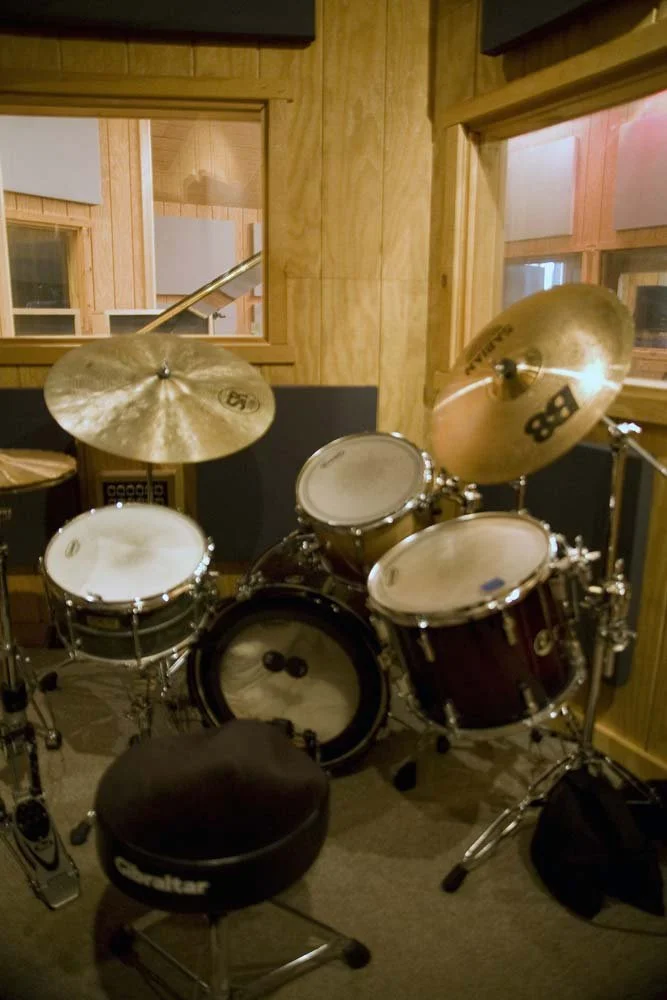 Interior shot of SpectraSound LLC recording studio showing creative and professional audio environment