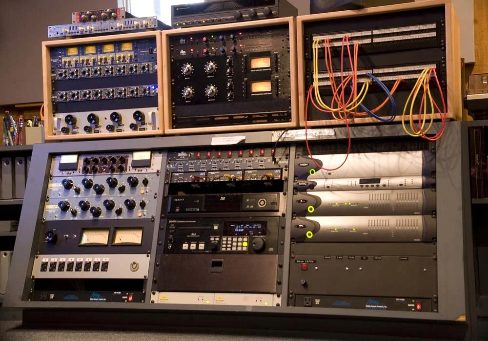 Rack of outboard audio gear and processors in professional recording studio at SpectraSound LLC