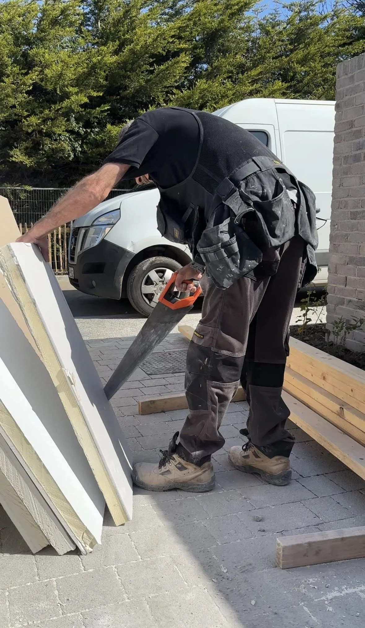 MikeConn Team Sawing plasterboard