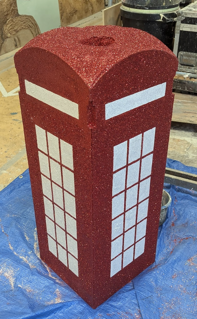 Painting and Glittering a Telephone Box for Our House the Musical. Designed. Reuben Dutch. Prop lead - Connor Glennie.