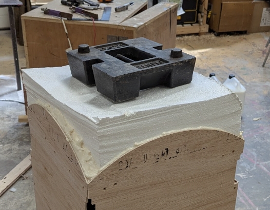 Carving the Top of a Telephone Box for Our House the Musical.  Designed. Reuben Dutch.