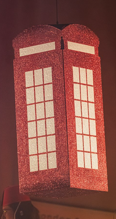 Telephone Box for Our House the Musical. 
Playwright - Tim Firth
Director and Choreographer: Mark Smith
Set designer: Reuben Dutch
Lighting designer: Charlie Moore
Photographer: Kirsten McTernan
Prop lead - Connor Glennie.