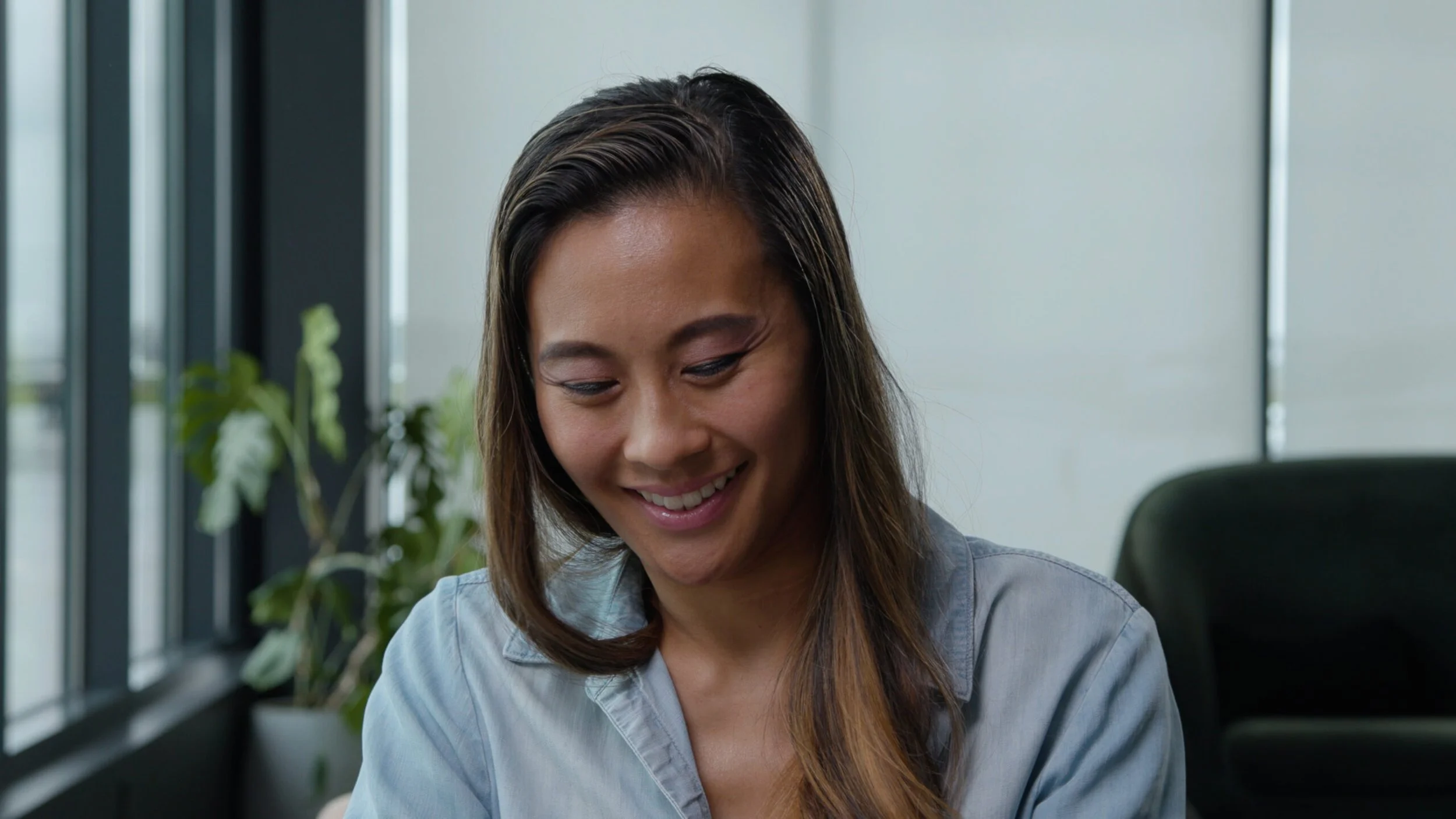 Someone using the Sloan Mobile Handwashing Station