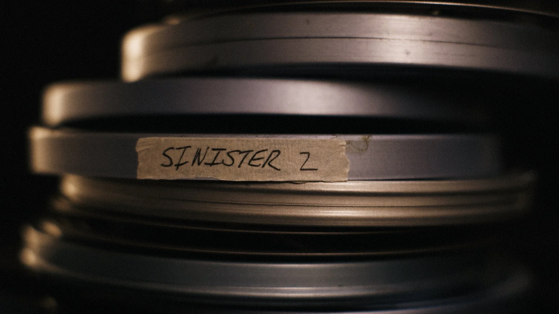 Vintage 16mm film reels stacked