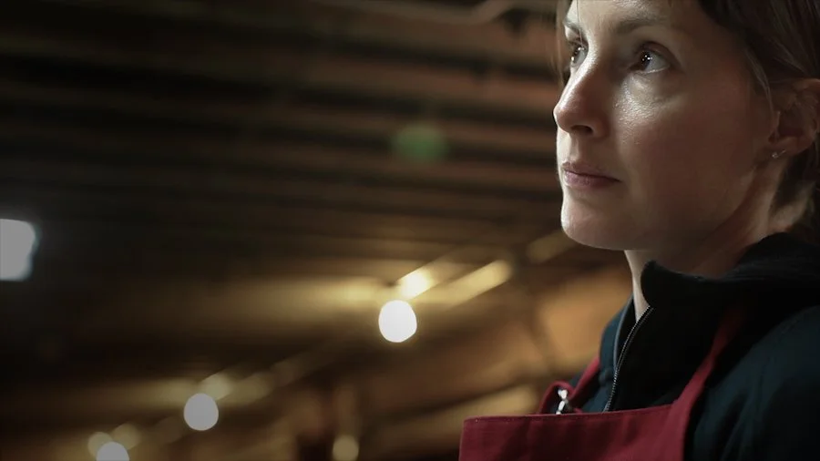 Close up of Sharon Burdett, deep in thought during design process