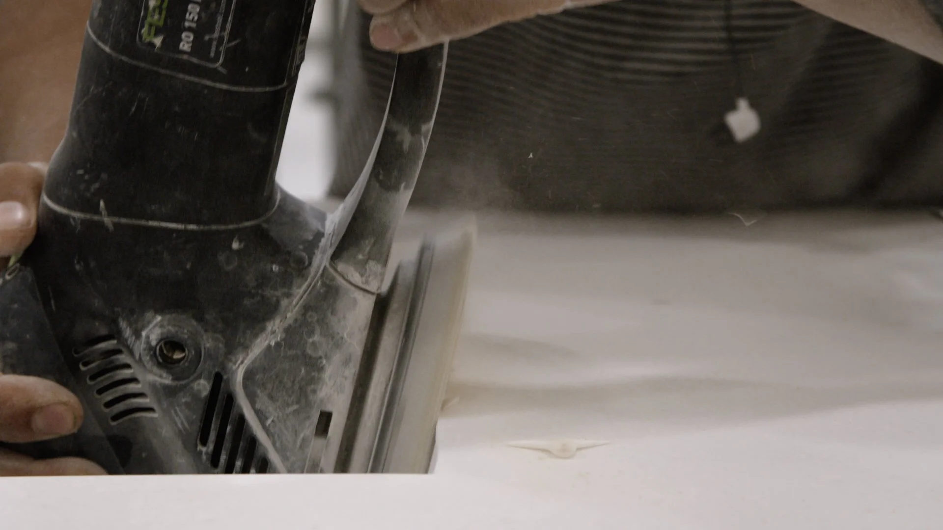 Closeup of sanding quartz countertop