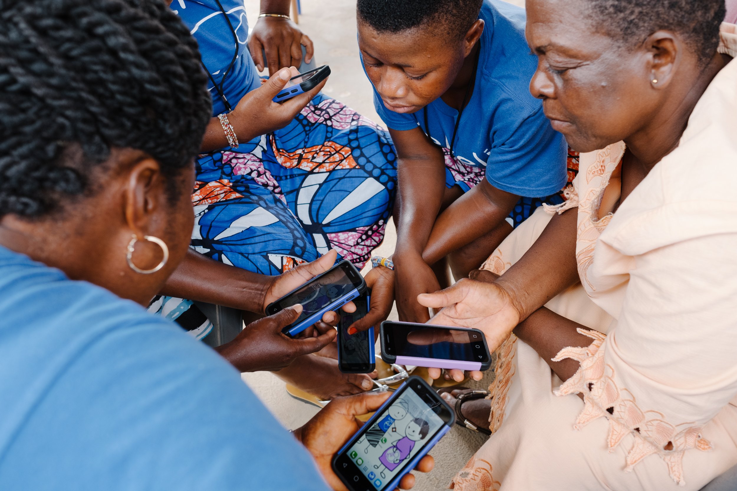 Kekeli community health promoters learning their new app