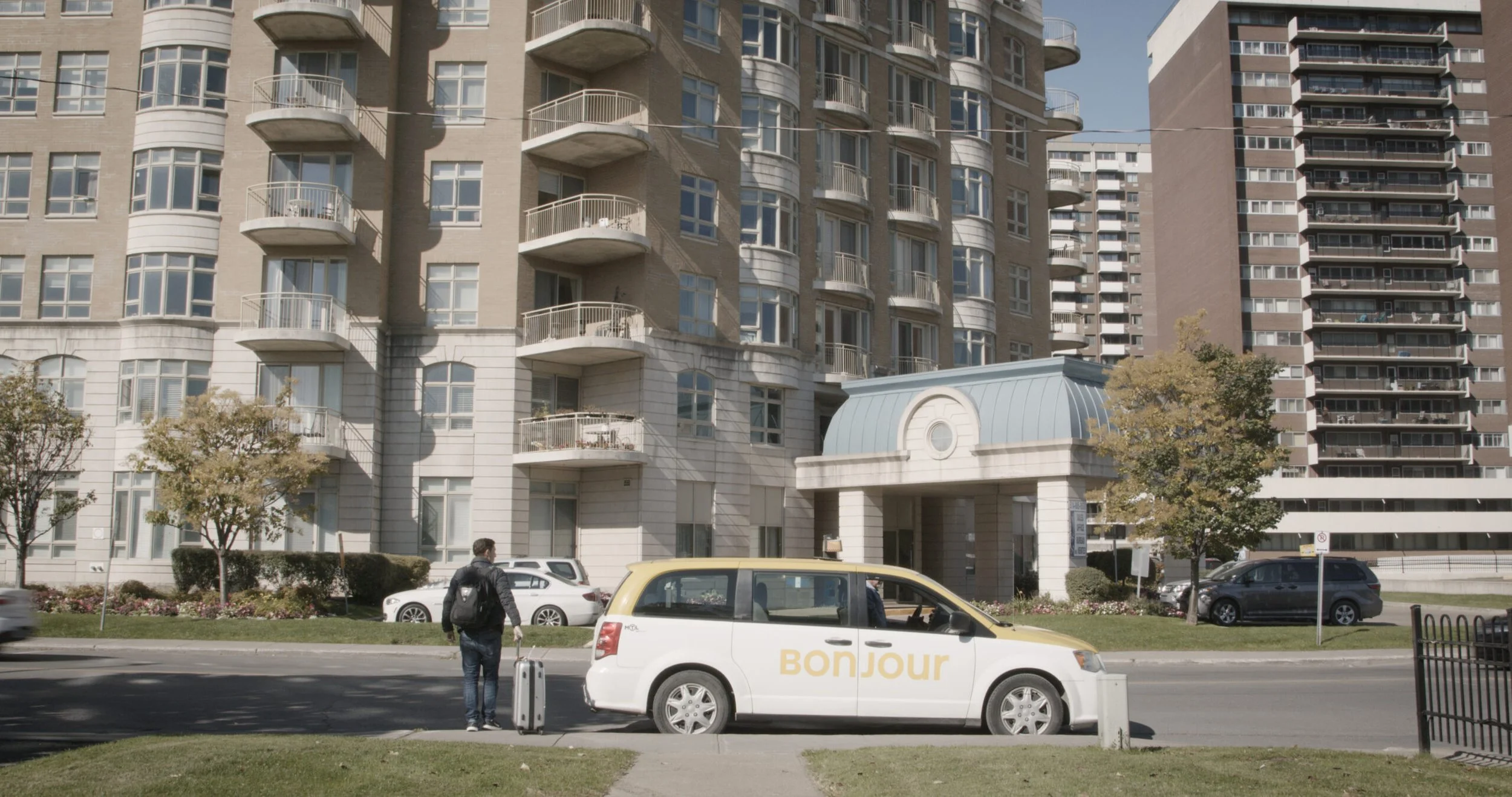 Man arriving at a apartment building