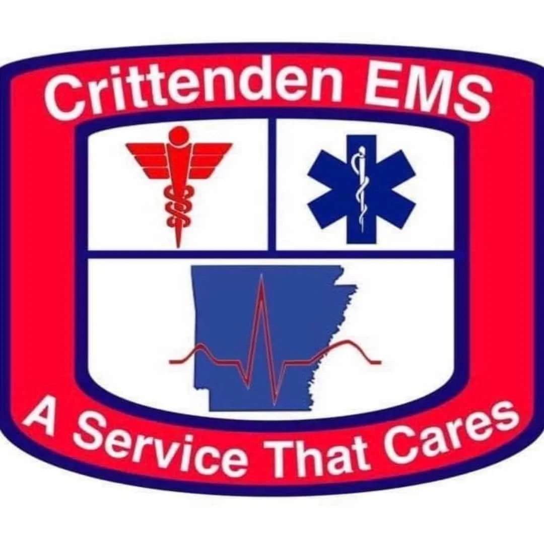 Patch of Crittenden EMS with symbols of medical care, including a caduceus, a medical star of life, and an ambulance heartbeat with the outline of Arkansas in the background and the tagline "A Service That Cares."