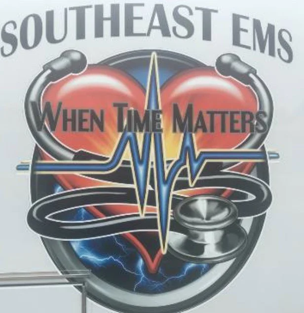 A graphic with a large red heart, an ECG heartbeat line, a stethoscope, and lightning bolts. Text reads "Southeast EMS" at the top and "When Time Matters" across the center.