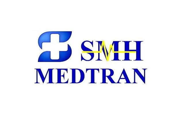 Logo with a medical cross symbol and the text 'SMH MEDTRAN' in blue, with yellow accents over the 'M' in 'SMH'.