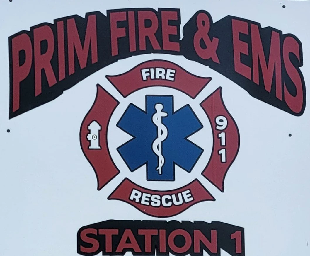 Logo of Prim Fire & EMS Station 1 featuring a fire department emblem with the words "Fire Rescue" and the year "1991".