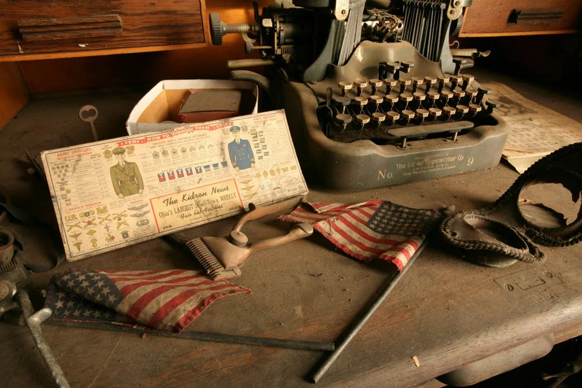 A typewriter and other historical artifacts at a military memorial in Central Virginia.