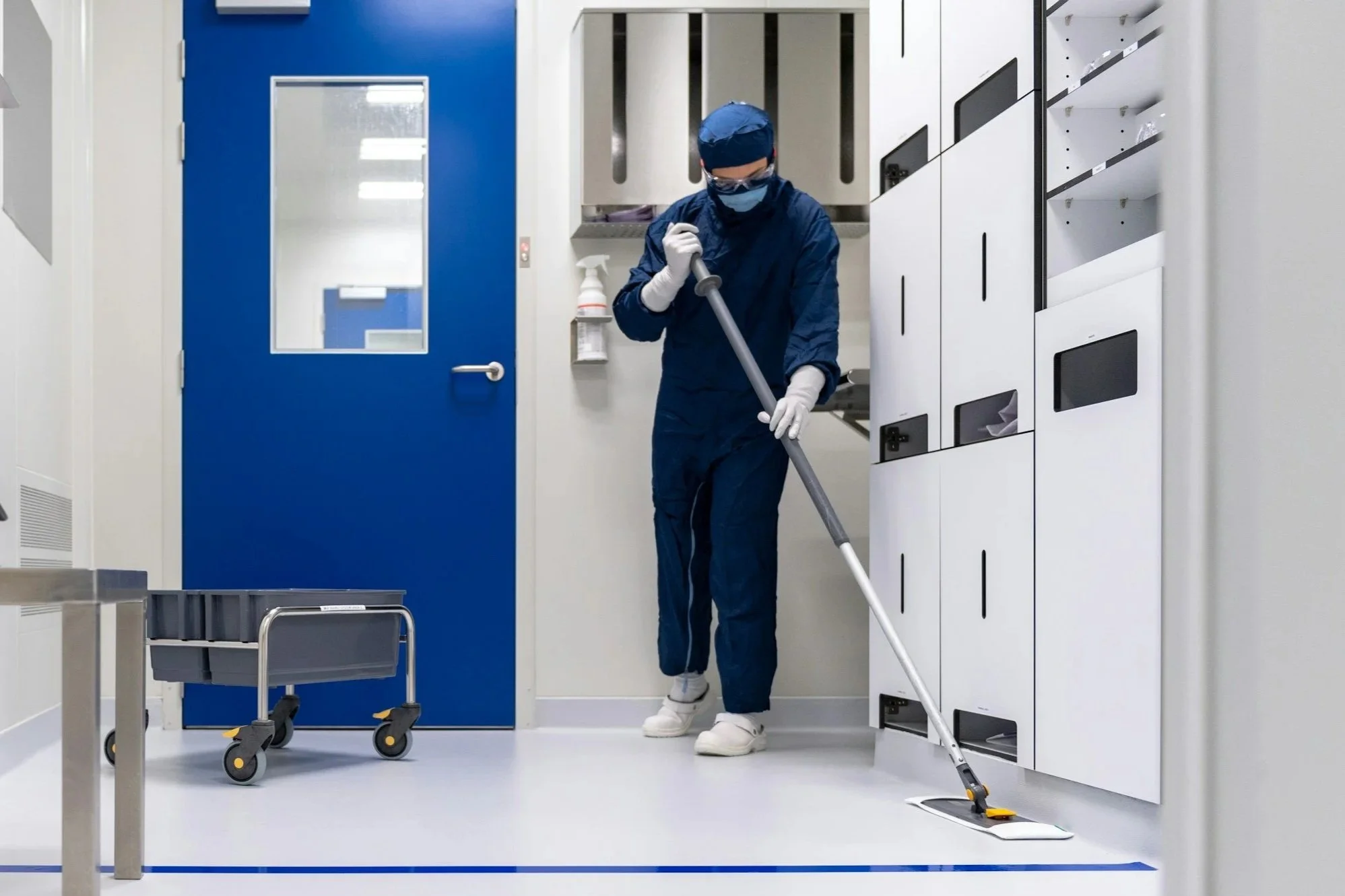 Commercial cleaning services in Columbus Ohio – worker mopping floors in a professional facility environment