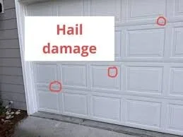 Garage door with a sign that reads 'Hail damage' and red circles marking damaged areas