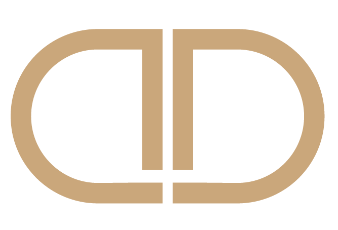 KNDRD Brand Mark A tan and beige abstract logo with symmetrical rounded shapes and a vertical line in the middle.