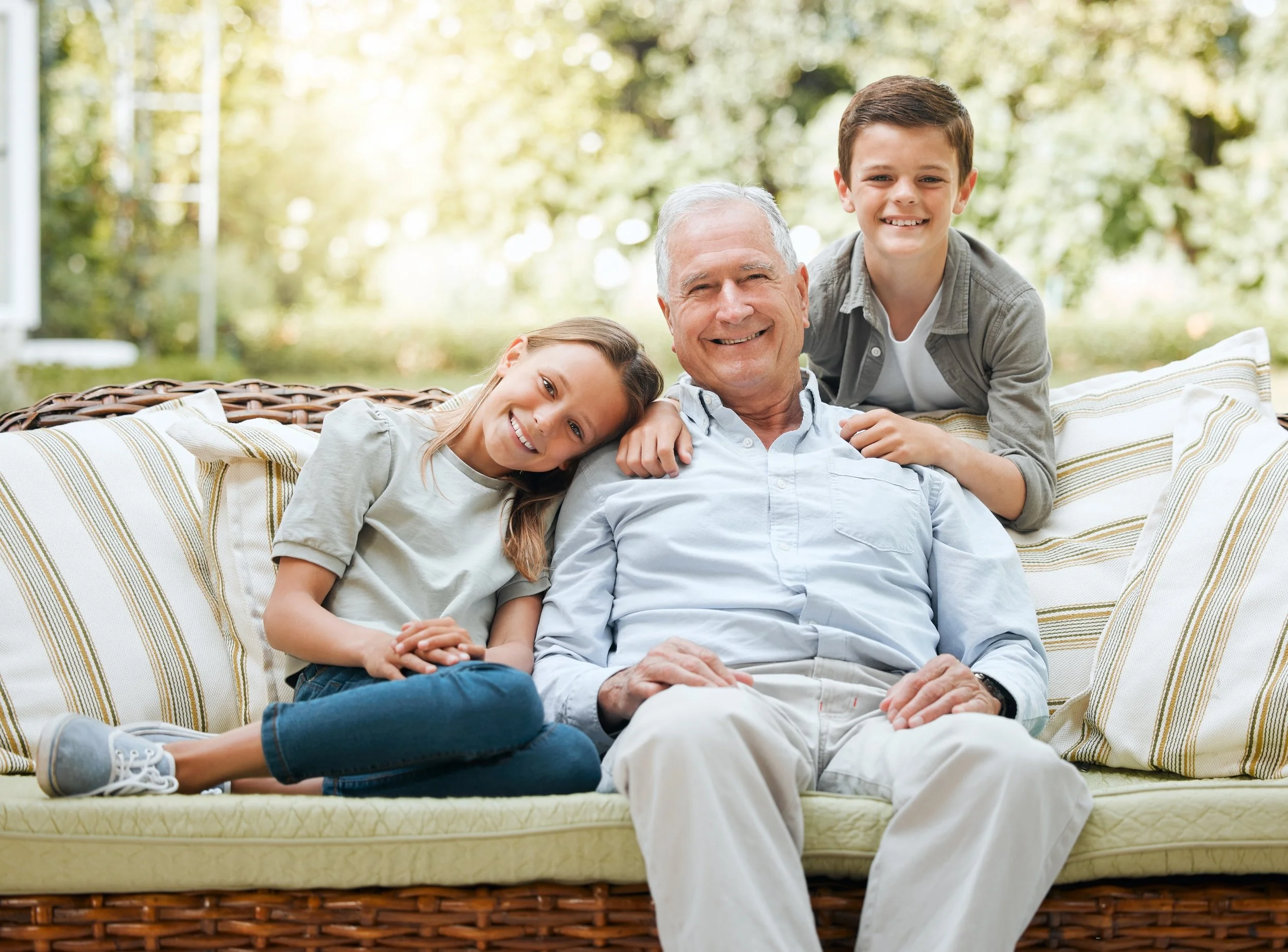 grandfather-relaxing-with-grandchildren-on-outdoor-2026-09-22-06-10-47-utc.jpg