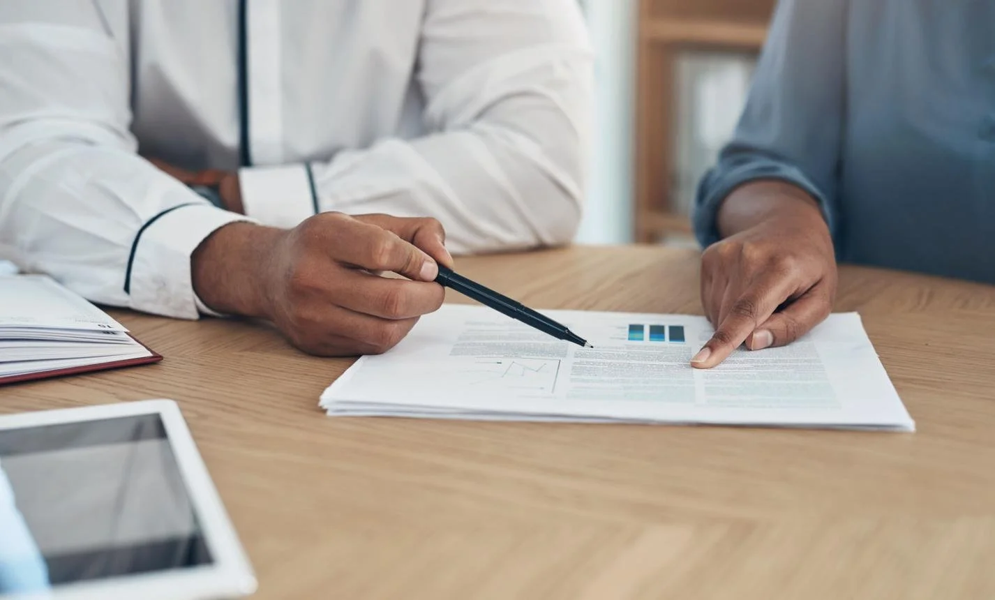 Reviewing clear financial reports after bookkeeping cleanup for a North Carolina small business