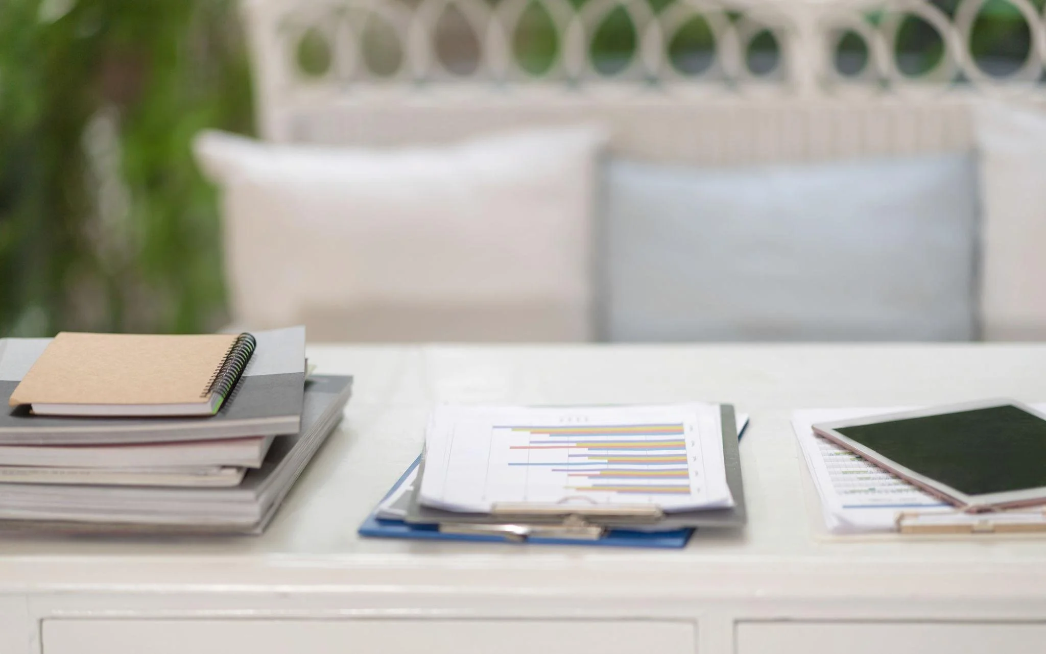 Unfinished but partially organized bookkeeping records on desk in a North Carolina small business