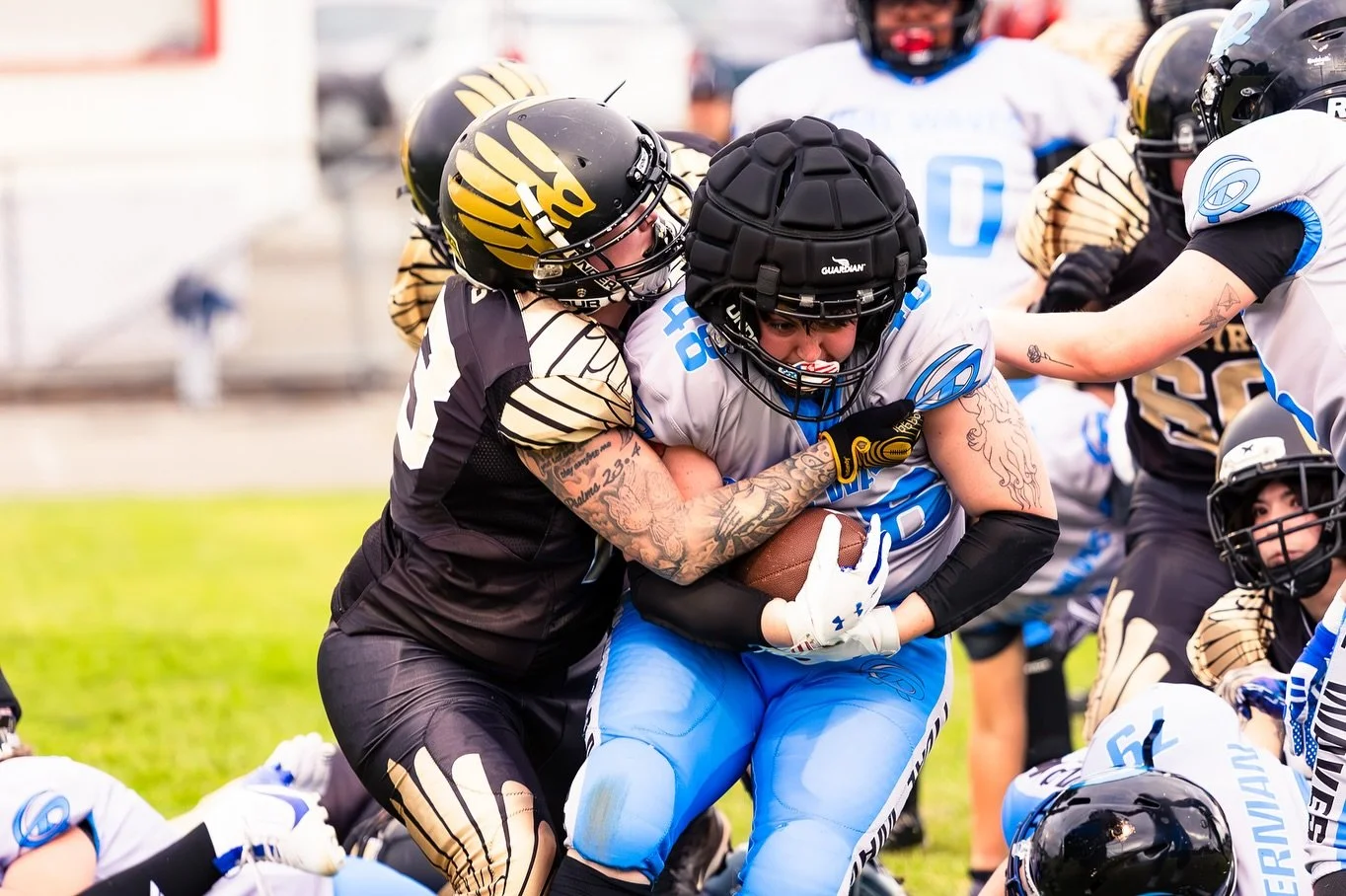 angel D line tackle pile.jpg