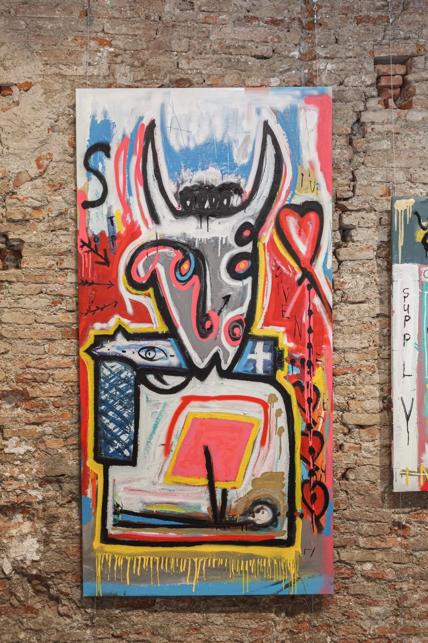 Tall figurative painting by PIGSY with horned character and bold colour gestures, exhibited in Malaga 2021