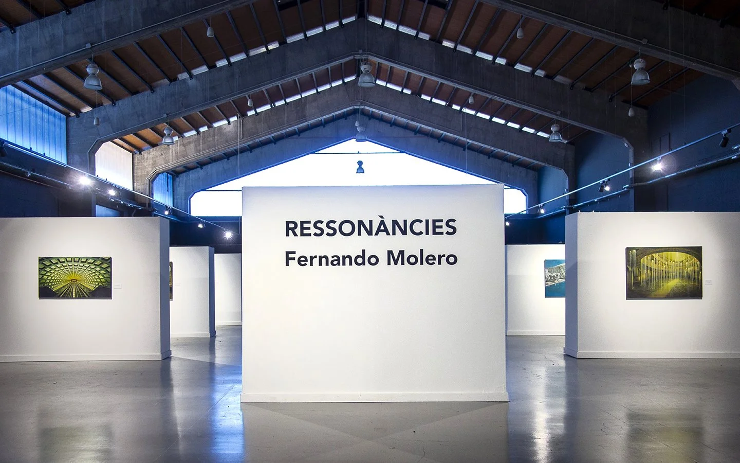 Installation view of “Ressonàncies” by Fernando Molero, featuring architectural exhibition space with large-scale paintings exploring light, atmosphere and spatial perception