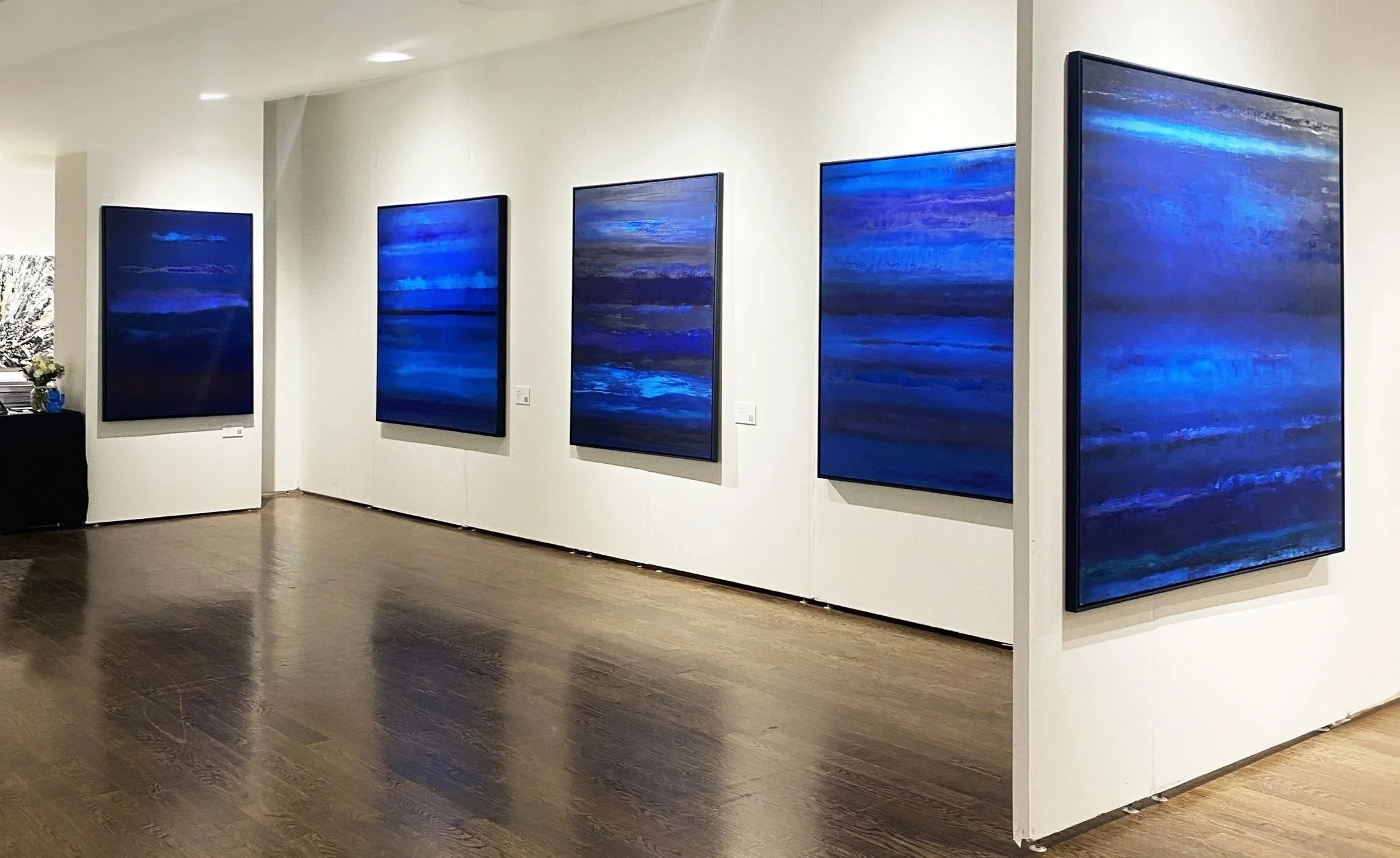 Paul Hughes installation view showing mixed media blue paintings on canvas in gallery