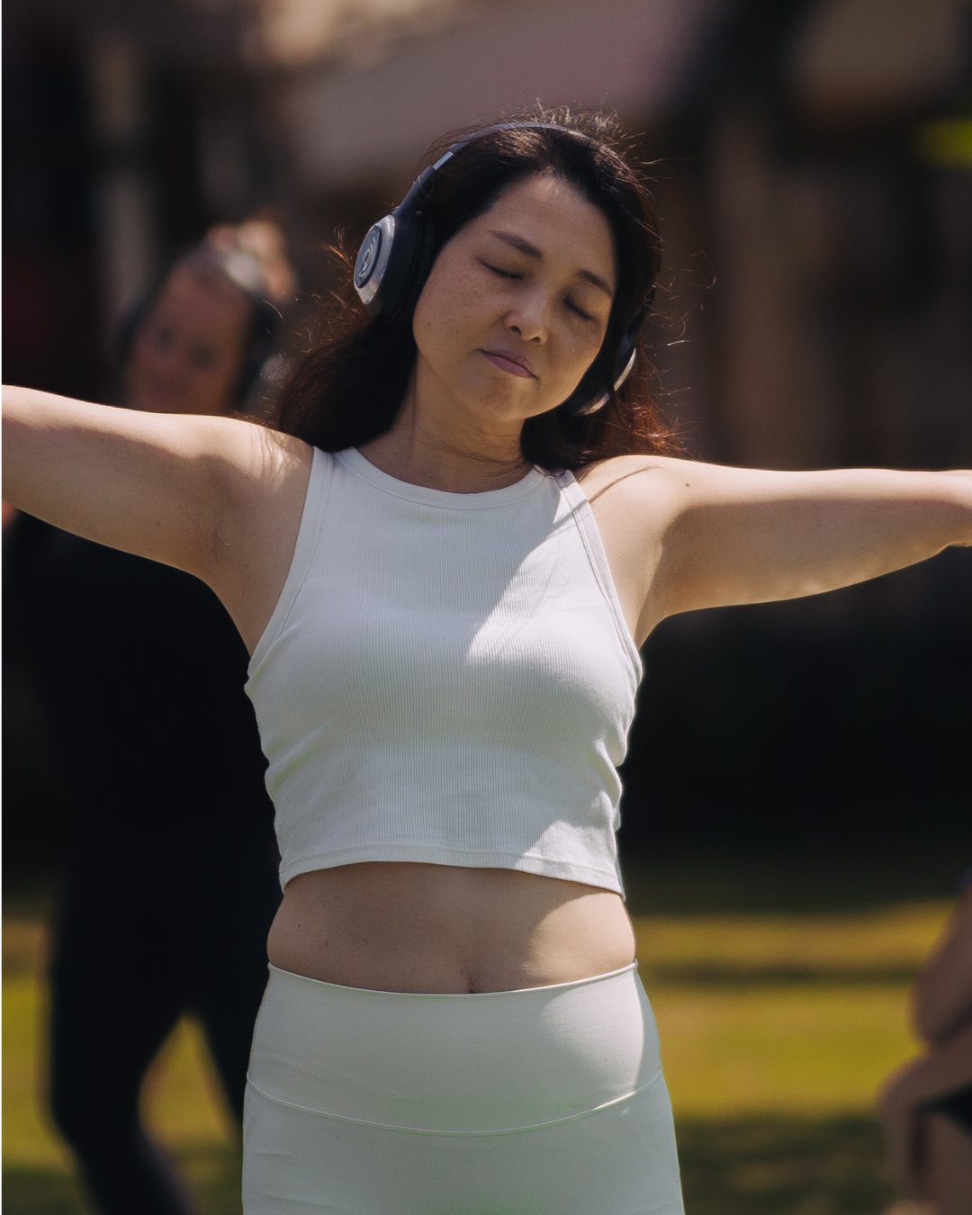 A client experiencing peace and nervous system regulation after a 9D Breathwork immersion in Hamilton.