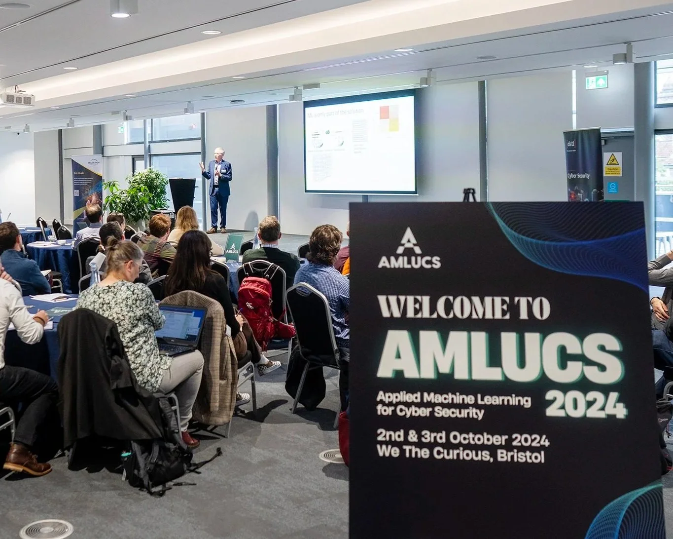WELCOME TO AMLCS, Applied Machine Learning for Cyber Security, 2nd & 3rd October 2024, We The Curious, Bristol." AMLUCS 2024