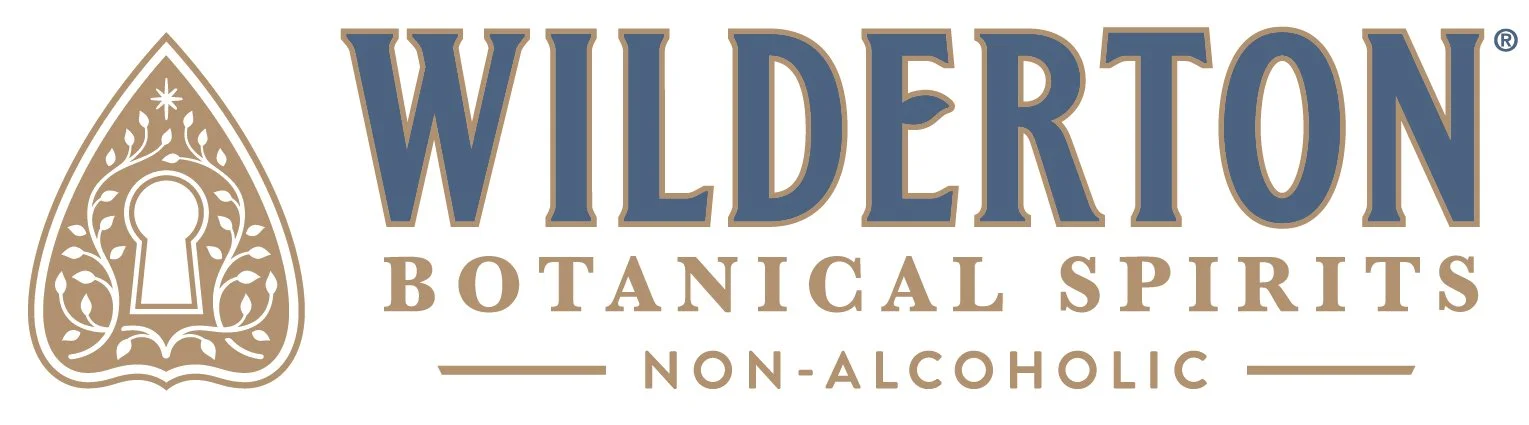 Logo for Wilderton Botanical Spirits Non-Alcoholic, featuring a decorative keyhole design with ornate detailing.