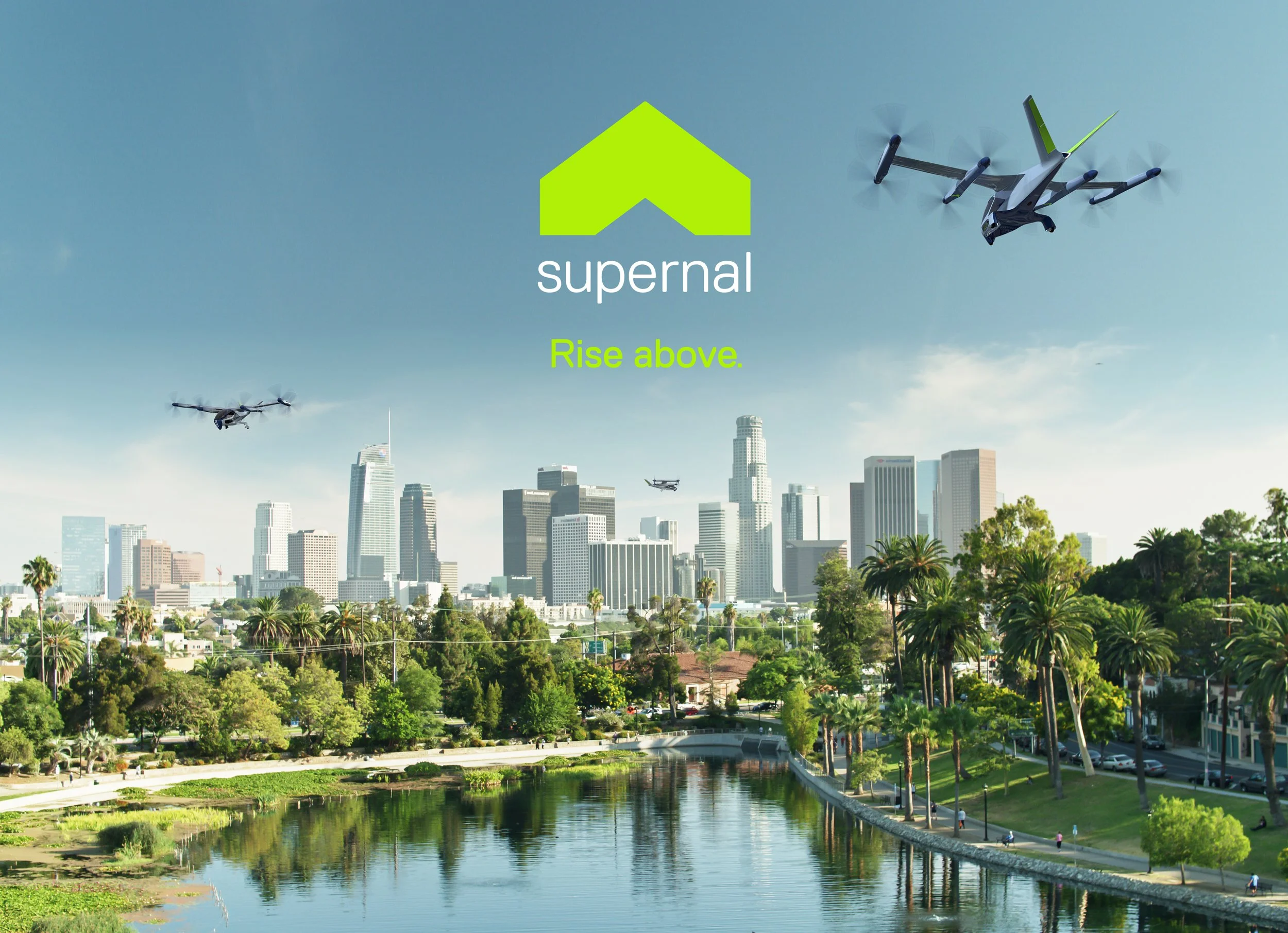 A cityscape with tall buildings and skyscrapers, a river in the foreground lined with trees and a walking path, and several drones flying in the sky. There is also a logo with a green house icon, the words 'supernal', and the slogan 'Rise above.'