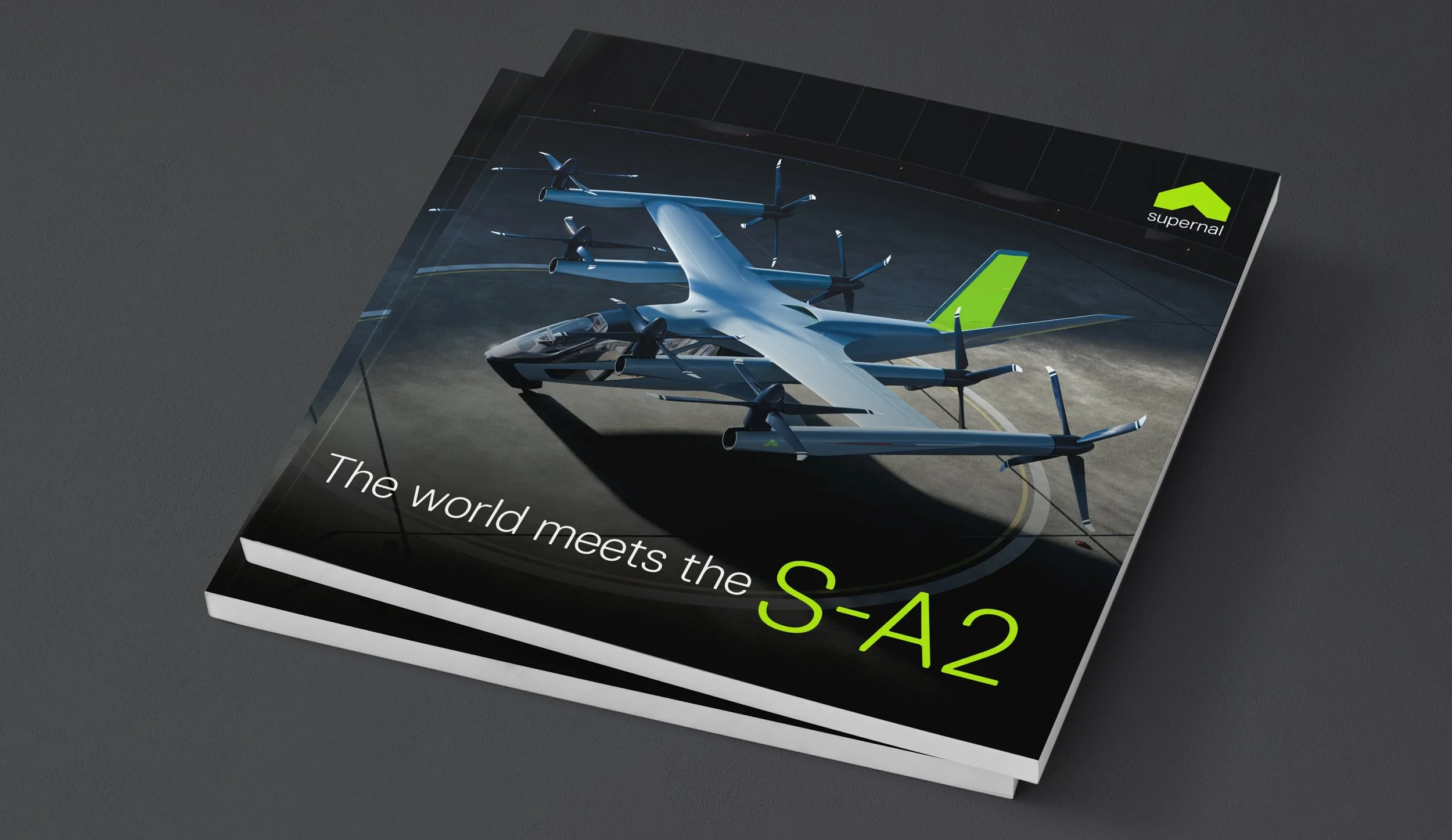 A book cover featuring a modern aircraft on a tarmac with the title 'The world meets the S-A2' and a logo labeled 'supernal'.