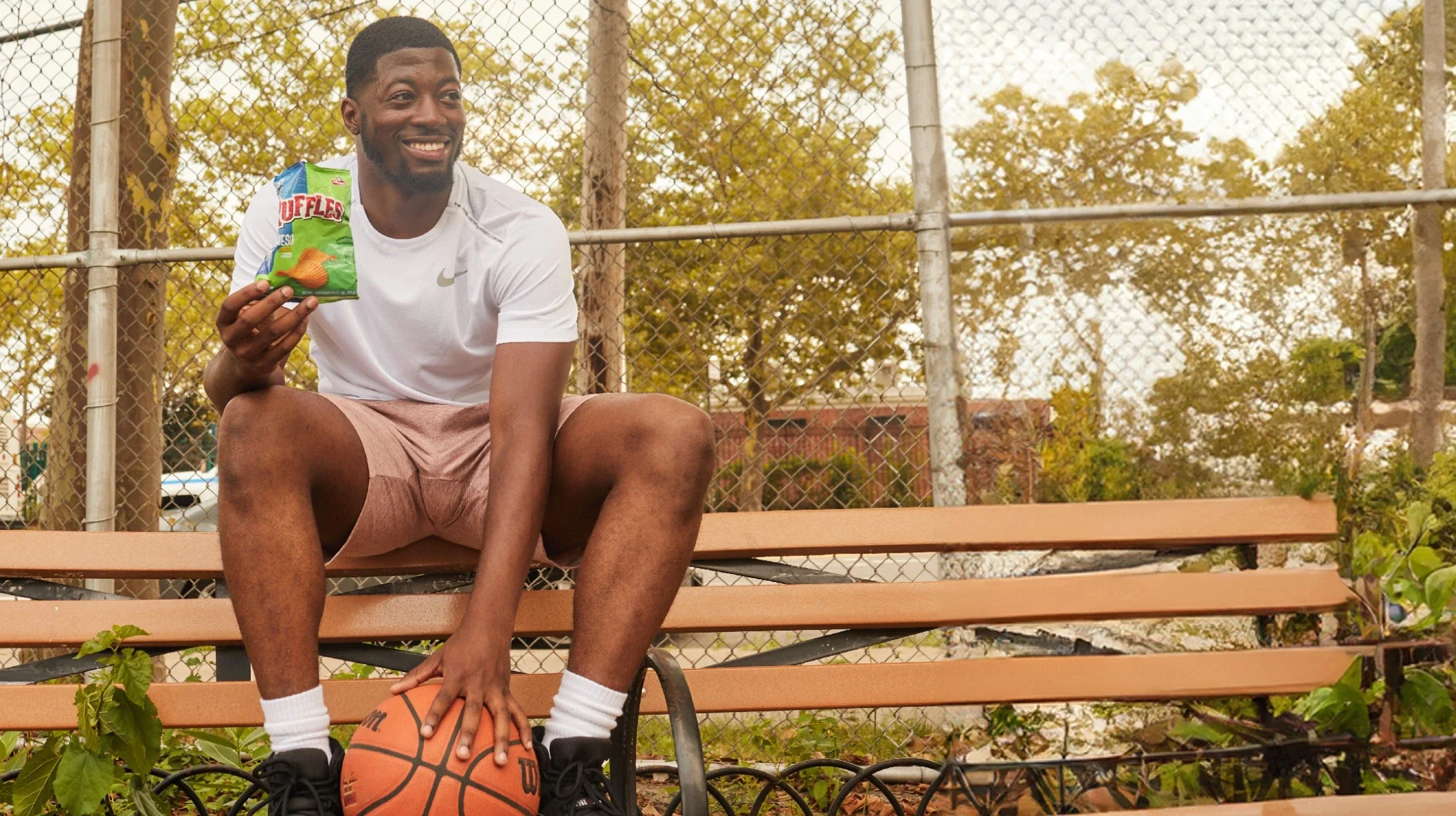 66dff8f7f947b62fb543da4d_woman sitting on a basketball.webp