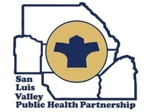 Outline map of Nevada with a gold circle and a dark blue t-shirt icon inside. Text reads 'San Luis Valley Public Health Partnership'.
