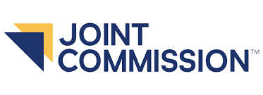 Logo of the Joint Commission with a blue and gold geometric design and the text 'Joint Commission' in dark blue.