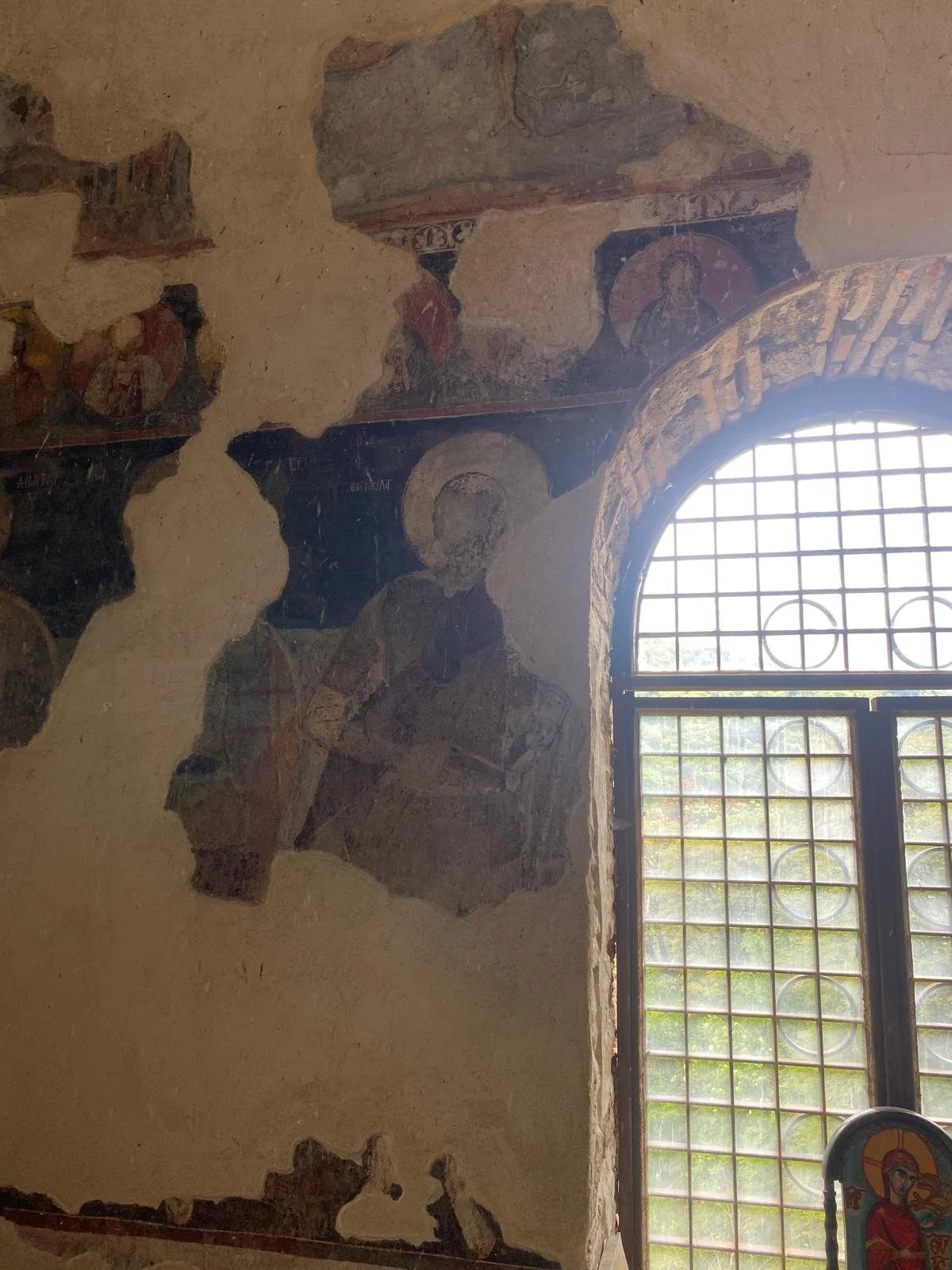 Inside monastery, ottoman invaders scraped the faces from the saints 500 years ago to effectively perform an iconoclast and erase traces of Christianity