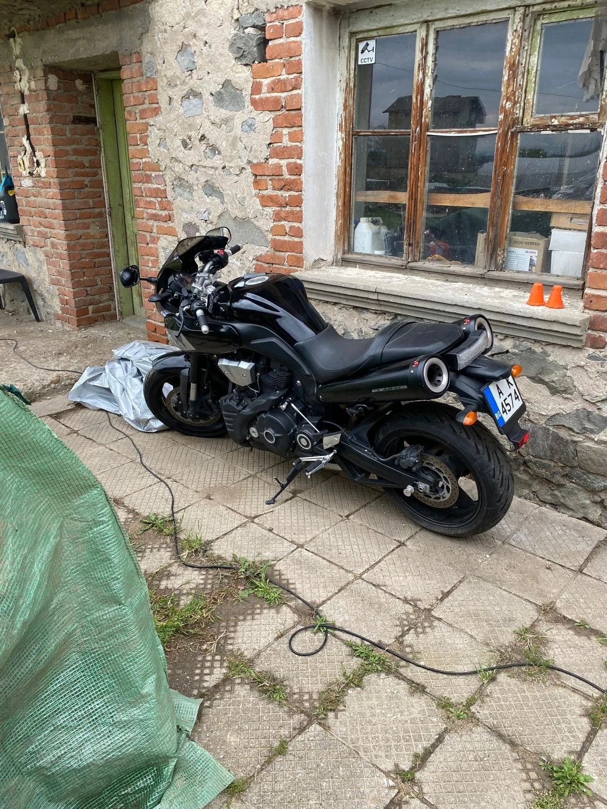 My friend Frank’s 1700 cc motorbike, I politely declined taking it for a spin