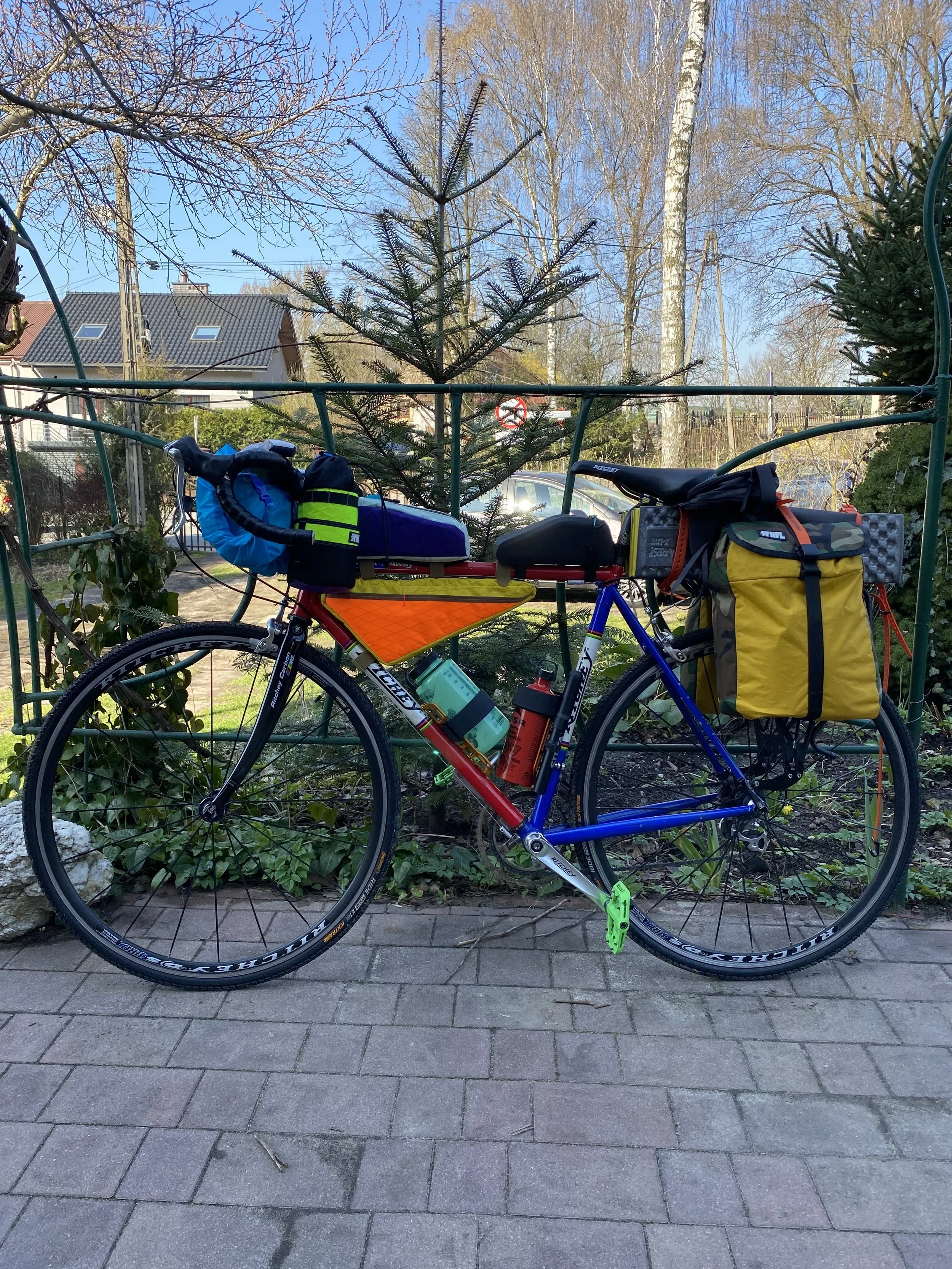 Ritchey steel frame road bike with mountain bike pedals, Shimano 18-spd drive train, continental gravel tires, and some lovely bags handmade by the Hassan brothers in Atlanta. 60 Pounds of Gear! Very lean.