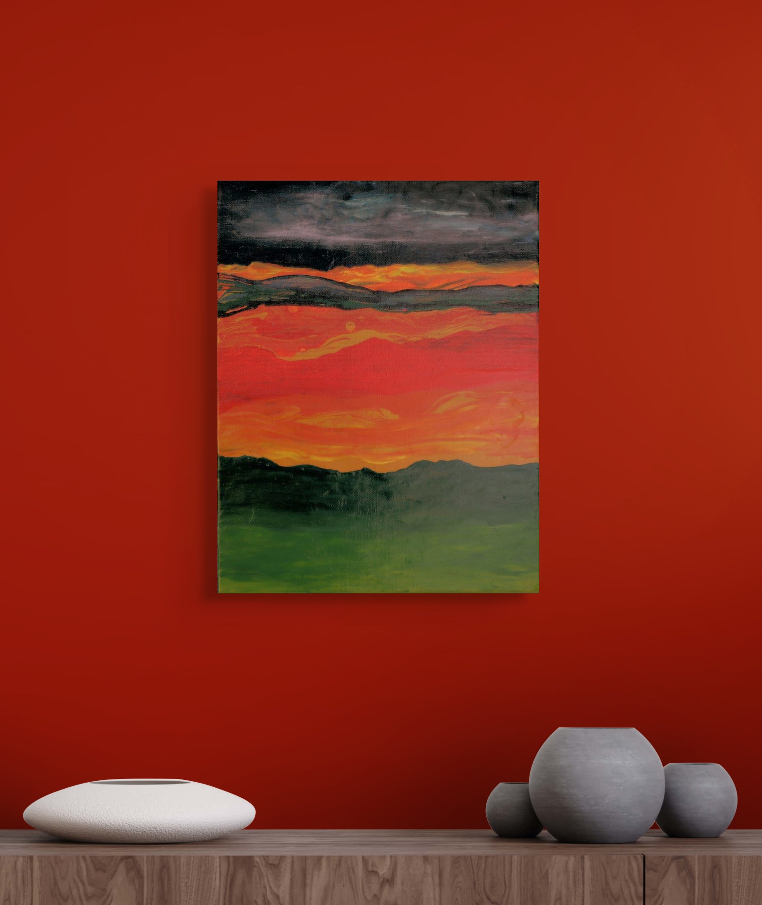 A modern interior with a red wall, a landscape painting, and decorative objects including a white rounded sculpture on a wooden surface and two gray vases.