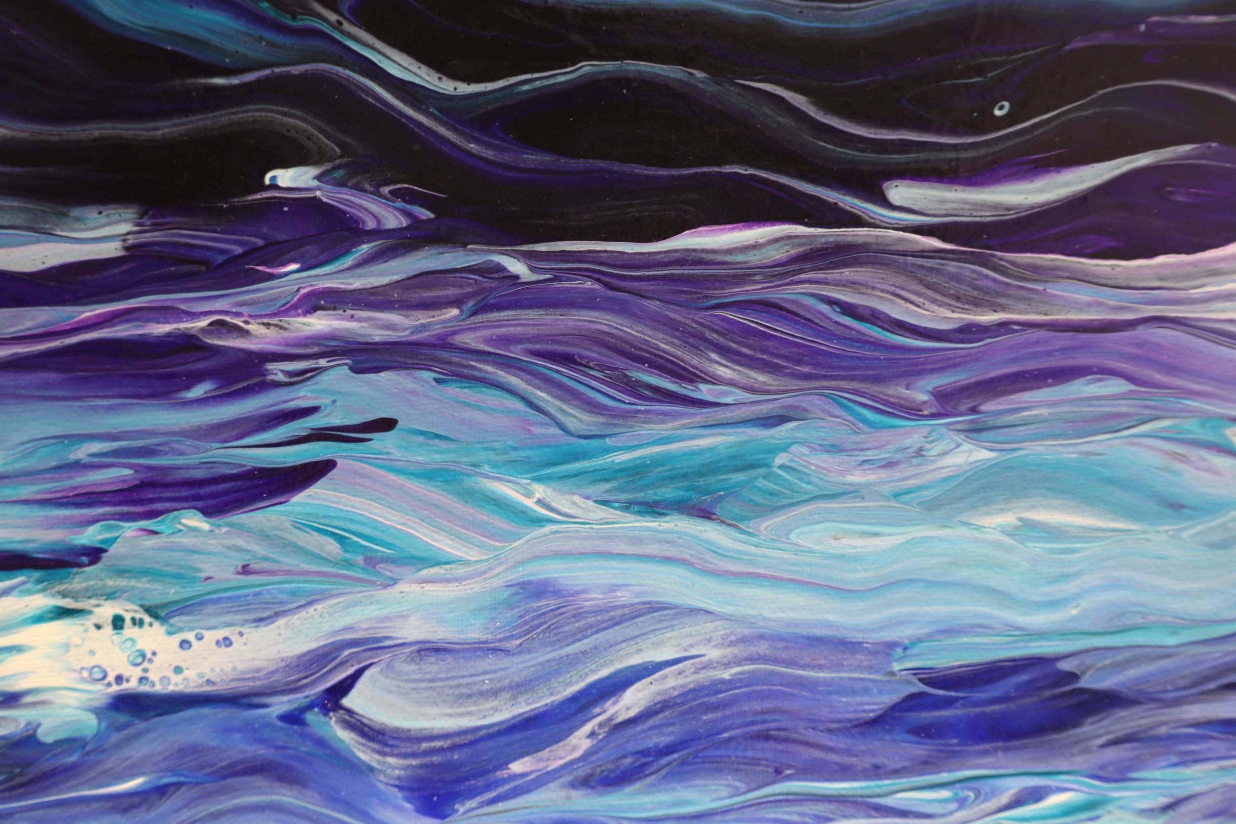 Abstract painting with swirling shades of purple, blue, black, and white.