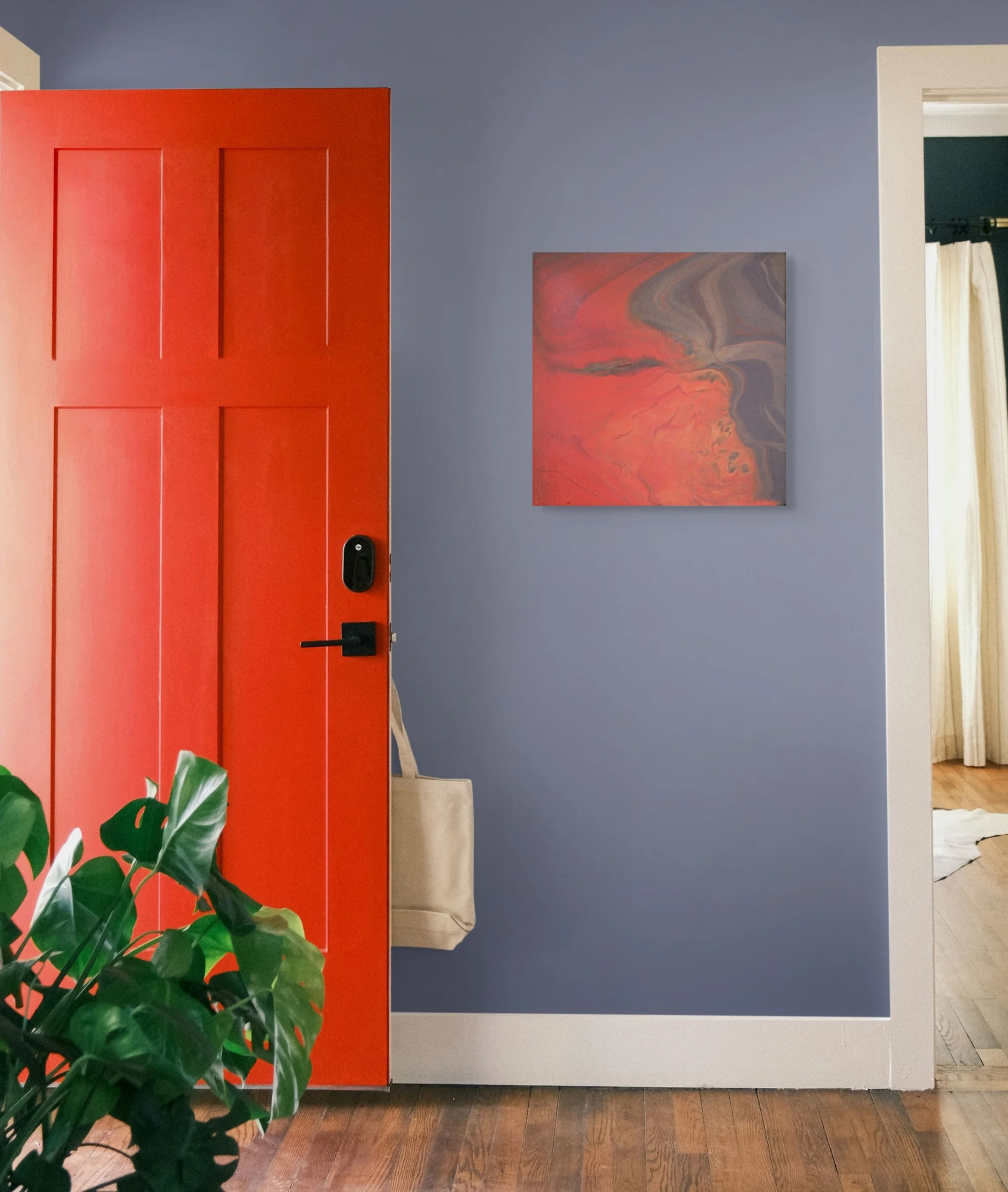 Part of a modern living room with a gray wall, a red shelving unit, a colorful abstract painting, and a white door frame with a glimpse of curtains. There is a green houseplant in the foreground and hardwood flooring.