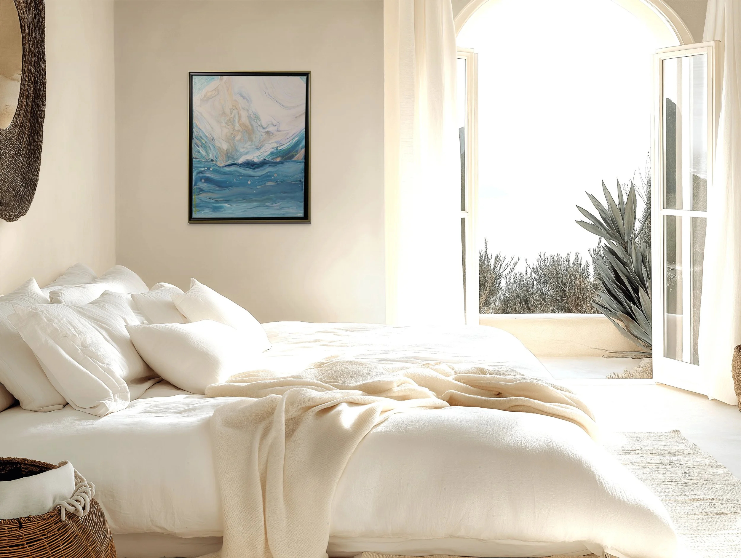 Bright bedroom with white bed, artwork on wall, and open window with curtains
