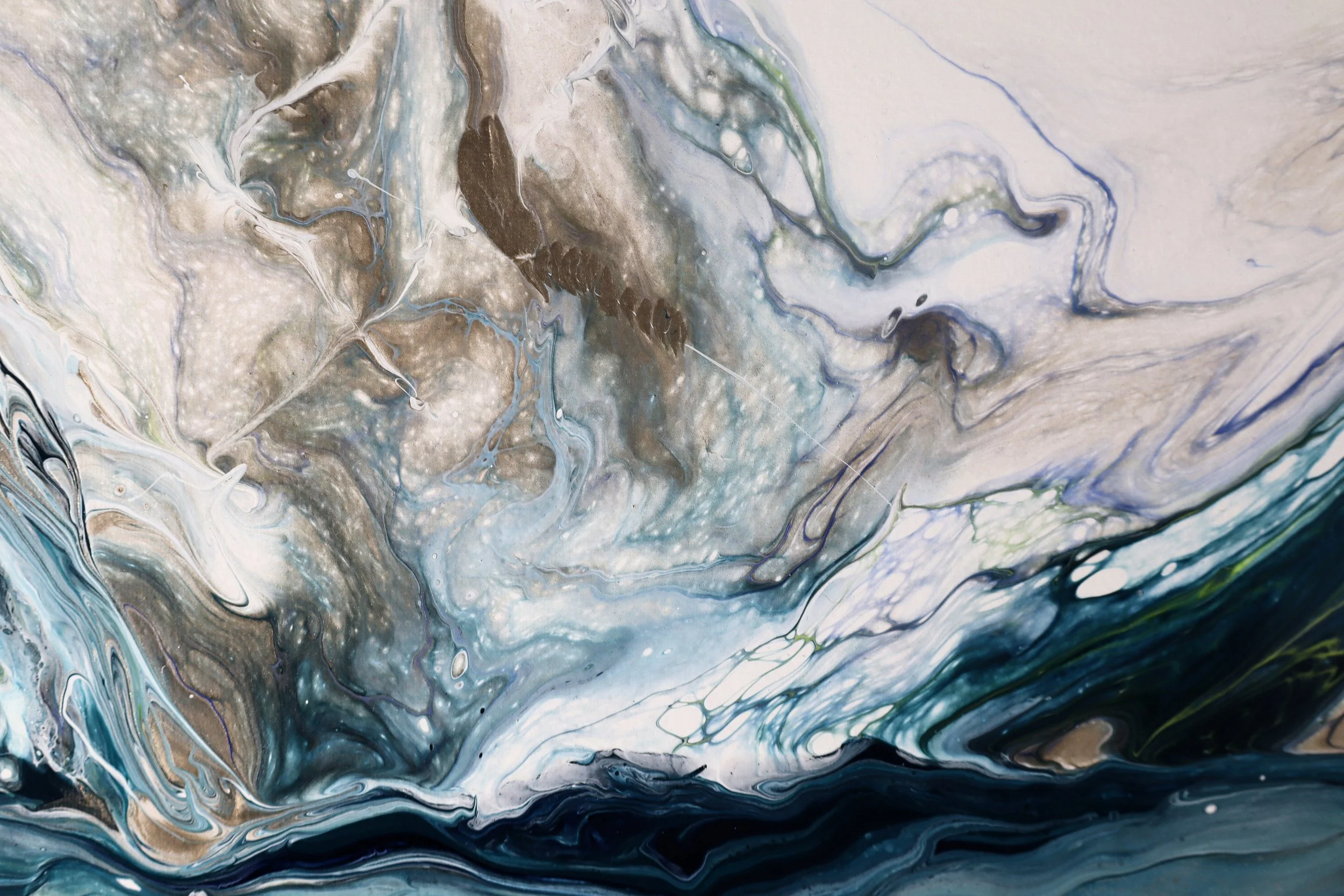 Swirling abstract acrylic paint with shades of blue, white, black, gray, and hints of green and tan.