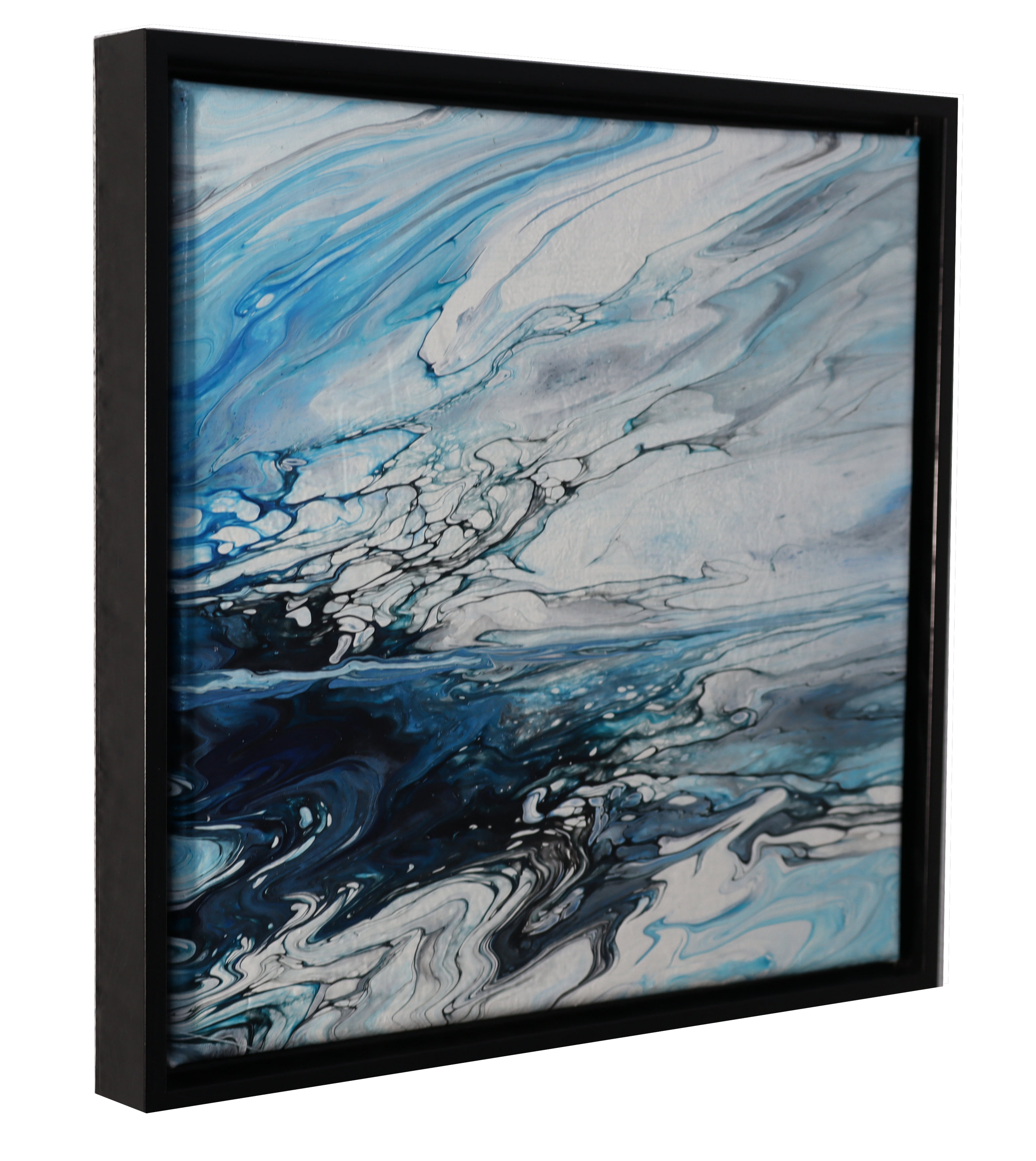 A modern flat-screen television displaying abstract art with swirling blue, gray, black, and white colors.