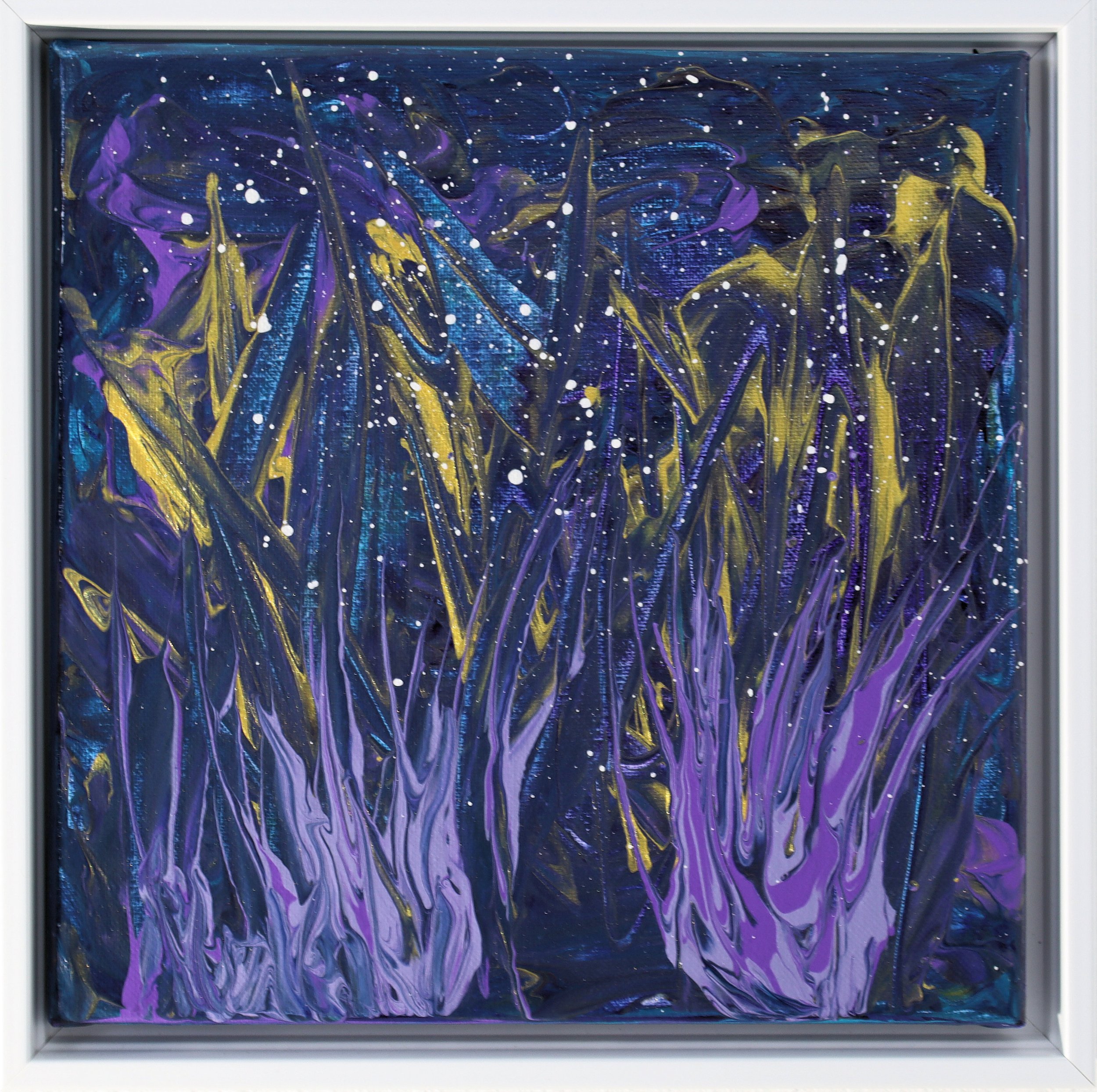 Abstract painting with swirling purple, blue, gold, and white splashes, framed in silver.