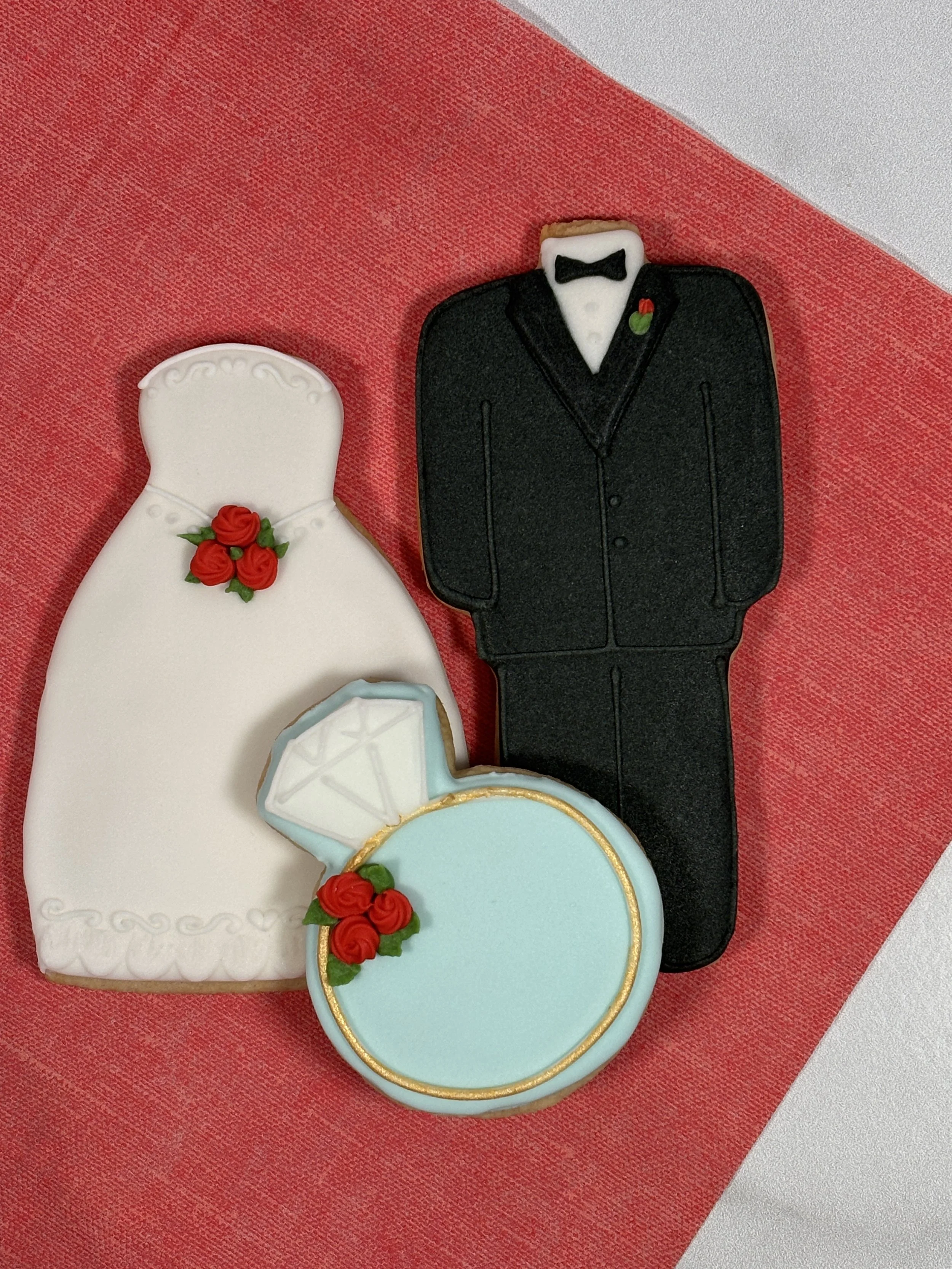 Custom wedding cookies — gown, tuxedo, and ring from Mary's Bakehouse